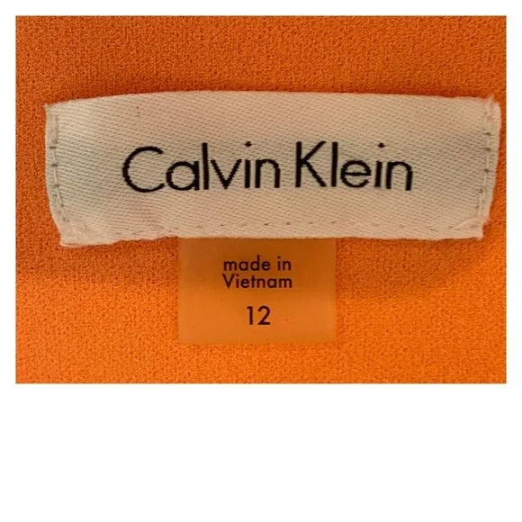 Calvin Klein Sleeveless Round Neck Seamed Sunburst Peach Knit Dress Size 12 - Picture 6 of 7